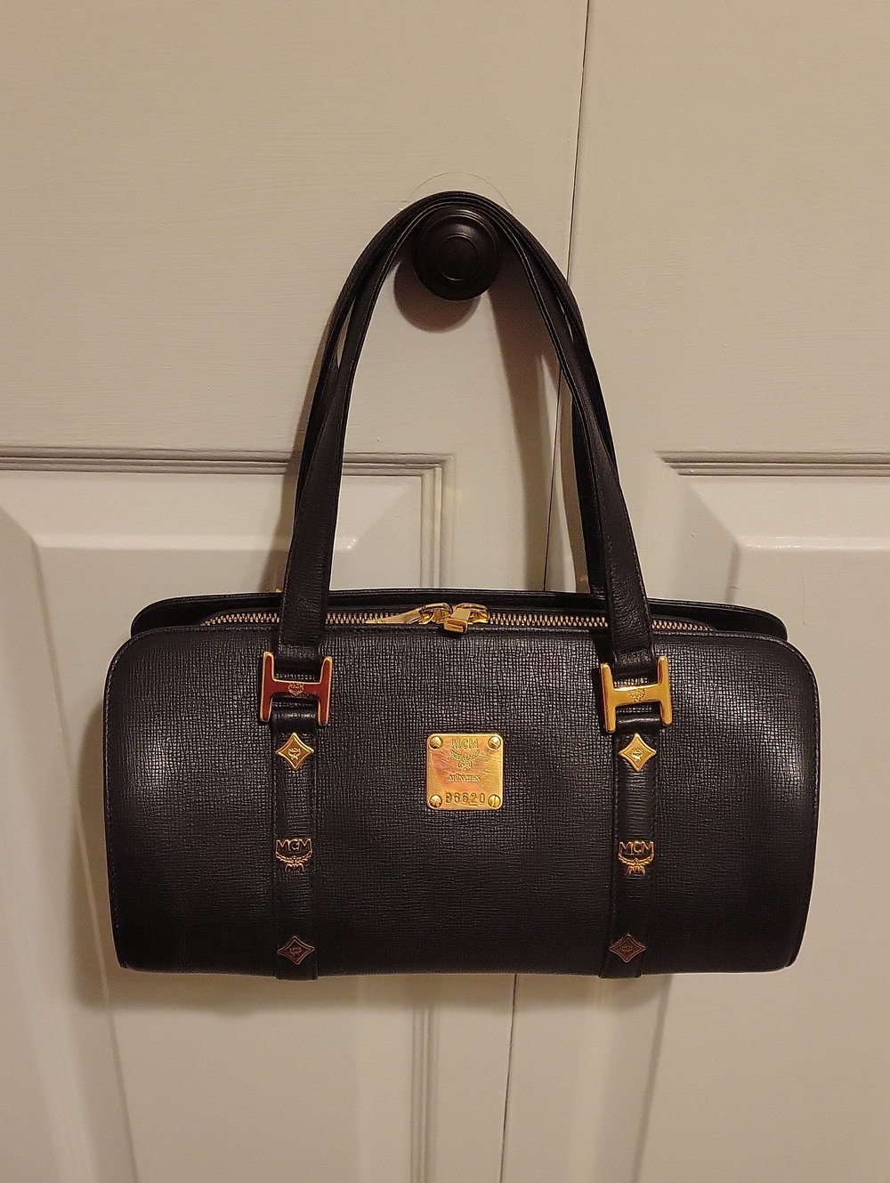 MCM Black Leather Barrel Satchel with Gold Accents